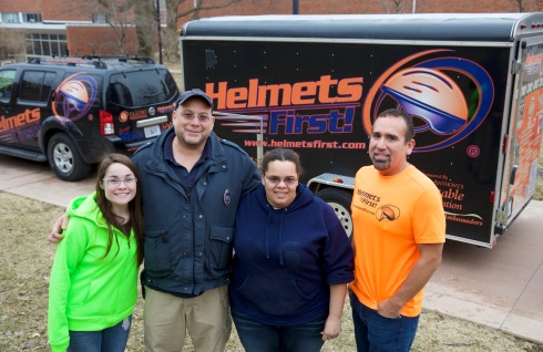 Dr Helmet and Illinois College students in front of trailer